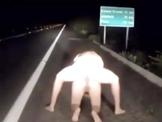 Couple Enjoying Lovemaking On Motorway